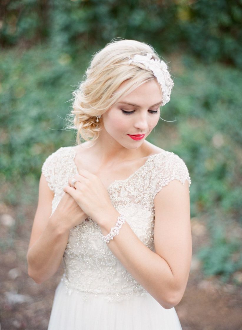 bride with updo and red lips