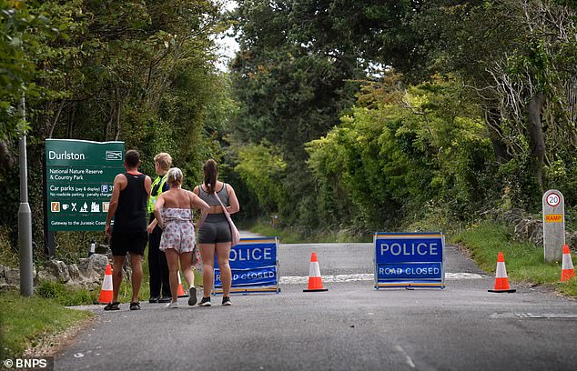 A man and a woman have been found dead inside a car this morning at an idyllic country park in Dorset