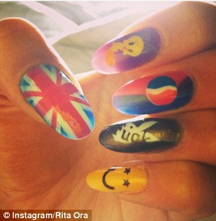 More is more: Nicki Minaj, right, matches her nail art with her diamonds while Rita Ora, left, opts for fun designs