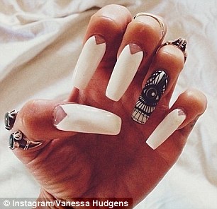 Claws out: Vanessa Hudgens, left, channels her style through her nail art, while Lily Allen, right, favoured a more abstract design