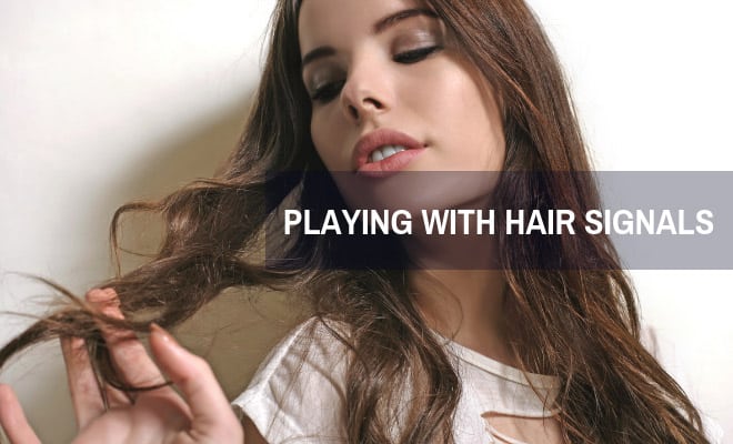 Find Out: Why Do Women Play With Their Hair?