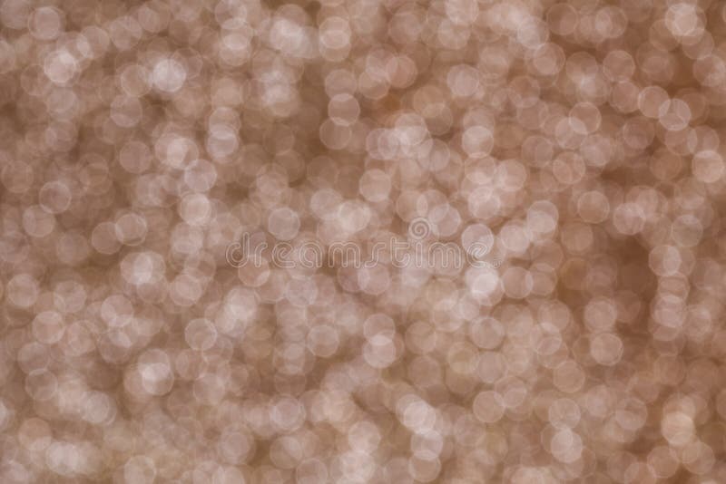 Abstract circular copper tone color bokeh background. Abstract empty space background royalty free stock images