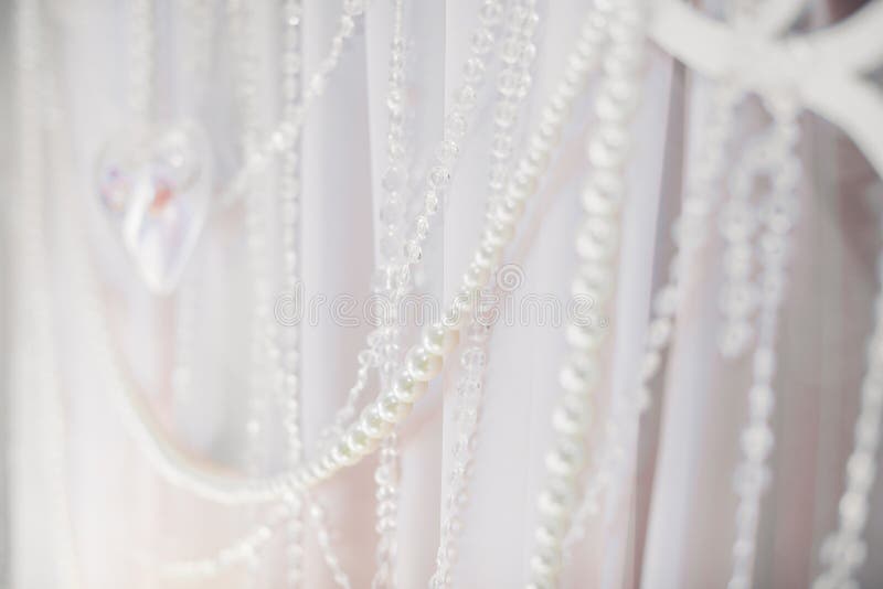 Background of white beads. strands of beads. Background of white beads. many strands of beads royalty free stock image