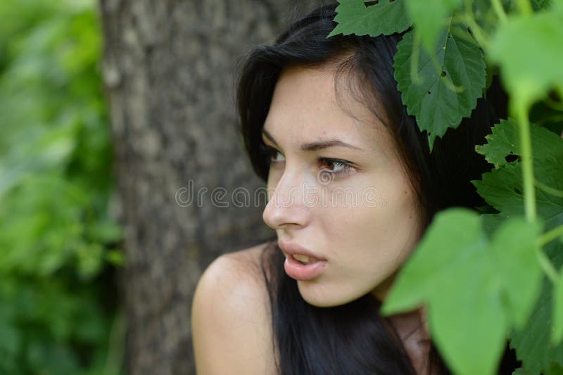 Beautiful young woman. In black clothing posing royalty free stock photos