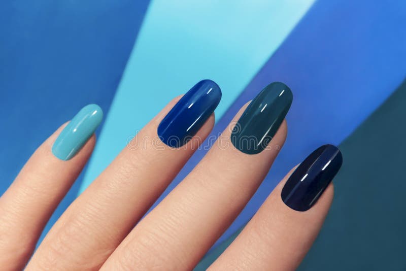 Blue manicure. stock photo