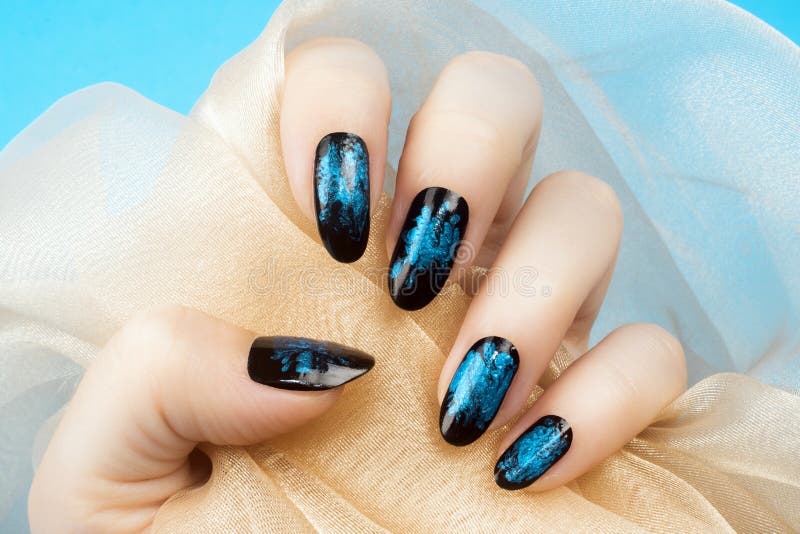 Blue nails manicure royalty free stock photos