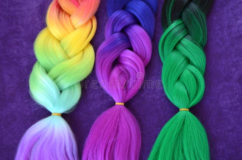 Kanekalon. Colored artificial strands of hair. Material for plaiting braids. Braids with kanekalona. Colored artificial strands of hair. Material for plaiting royalty free stock images