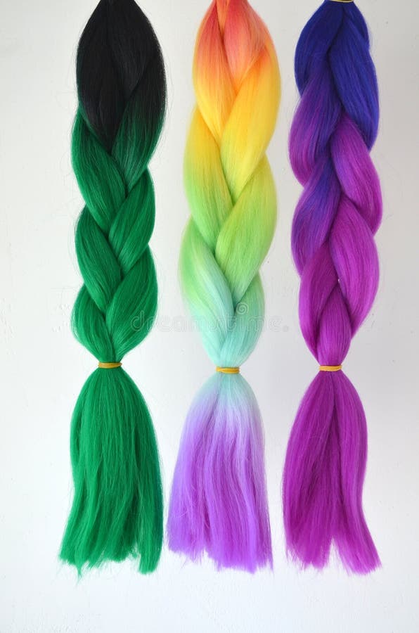 Kanekalon. Colored artificial strands of hair. Material for plaiting braids. Braids with kanekalona. Colored artificial strands of hair. Material for plaiting stock image