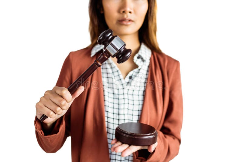 Businesswoman banging a law hammer on the gavel. On white background royalty free stock photo