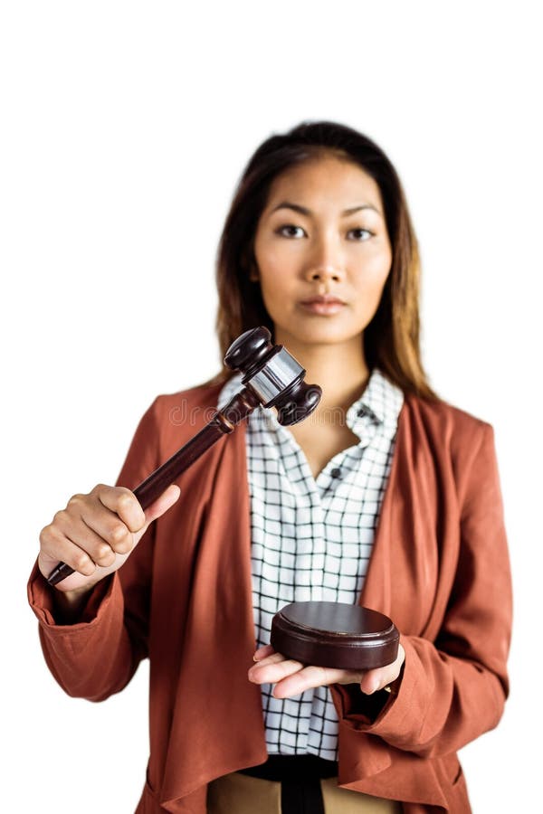 Businesswoman banging a law hammer on the gavel. On white background royalty free stock photos