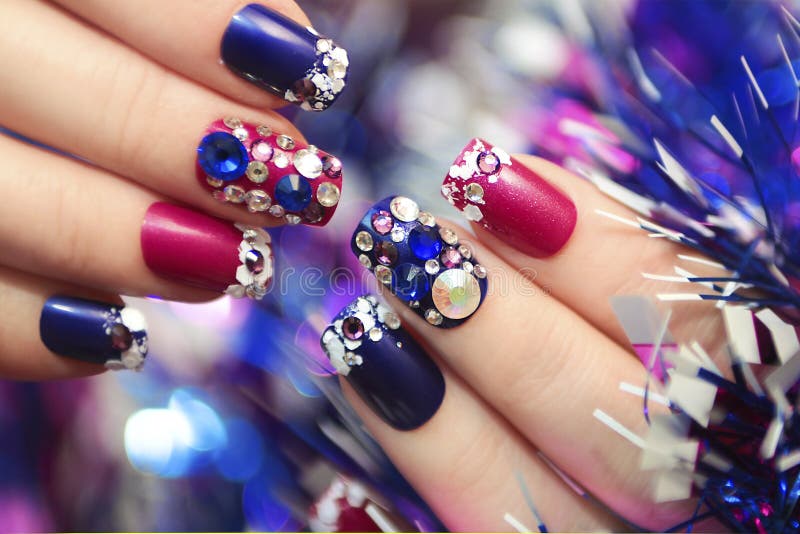 Christmas winter blue manicure. royalty free stock image