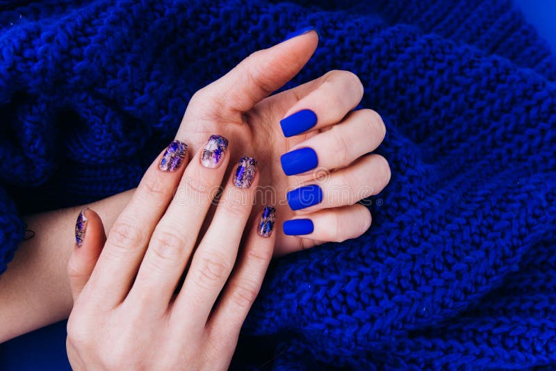 Classic blue manicure. The trend of the year. Color 2020. royalty free stock images