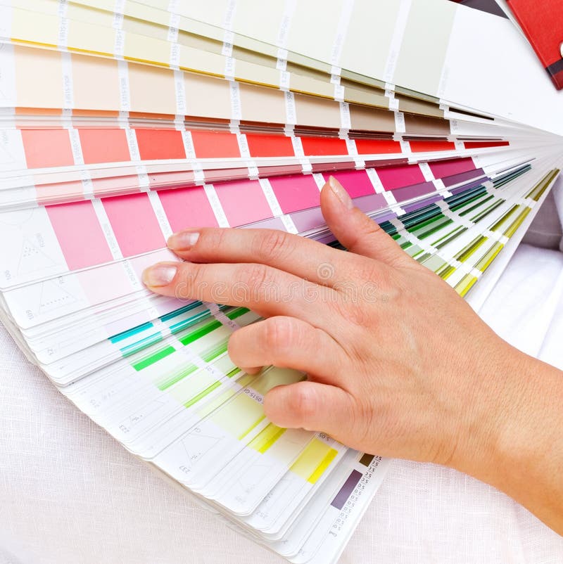 Color chart and woman hand stock images