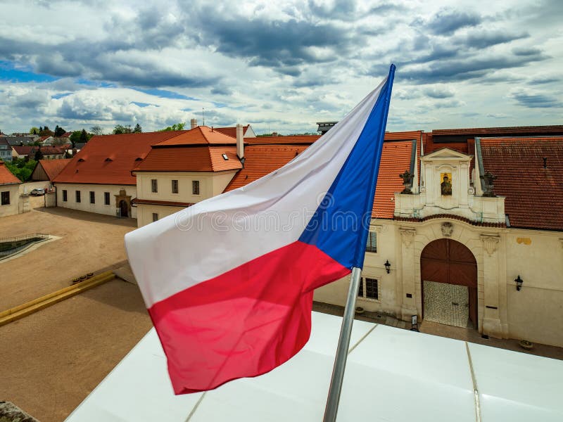 Czech flag waves on balcony of Litomysl Castle, Czech Pepublic. UNESCO World Heritage Site, republic, patriotism, waving, europe, freedom, flagpole stock photography