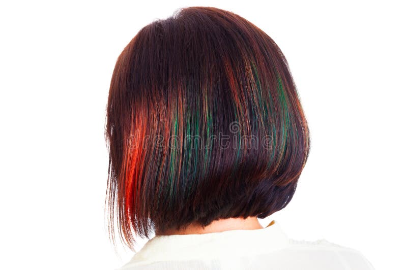 Female hair style with colorful strands behind picture. Female dyed hair style with colorful strands behind picture isolated on white concept royalty free stock photos