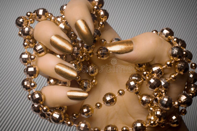 Bronze nails manicure stock photo