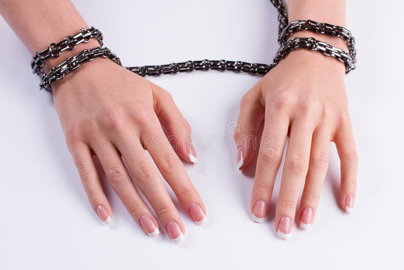 French manicure with a metal chain. stock images