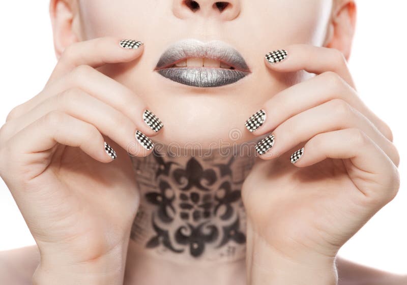 Lips and manicure royalty free stock images