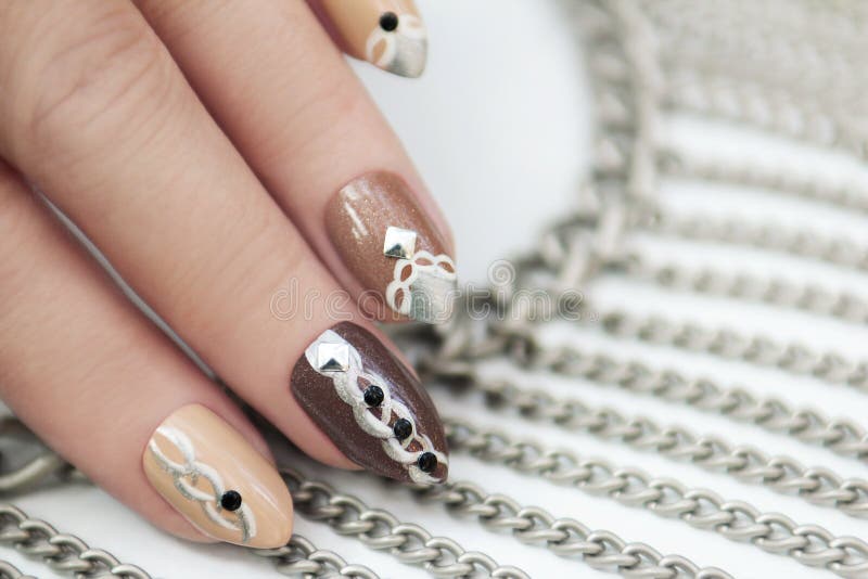 Manicure with chain. royalty free stock image