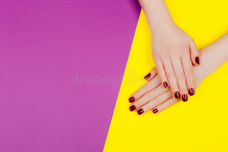 Manicure on divided background stock photo