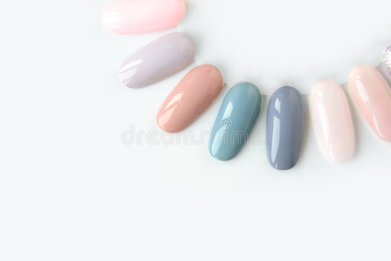 Nail polish samples in different bright colors. Colorful nail lacquer manicure swatches. royalty free stock photos
