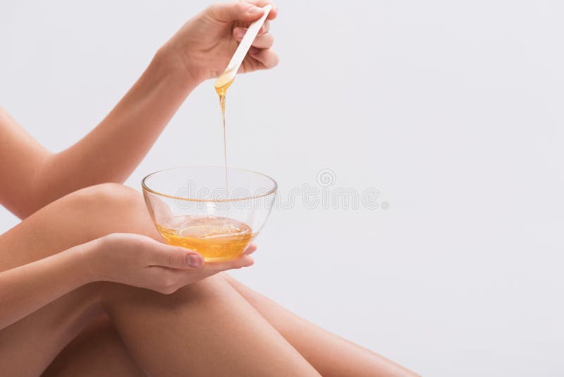 Sensual girl making waxing epilation stock photo