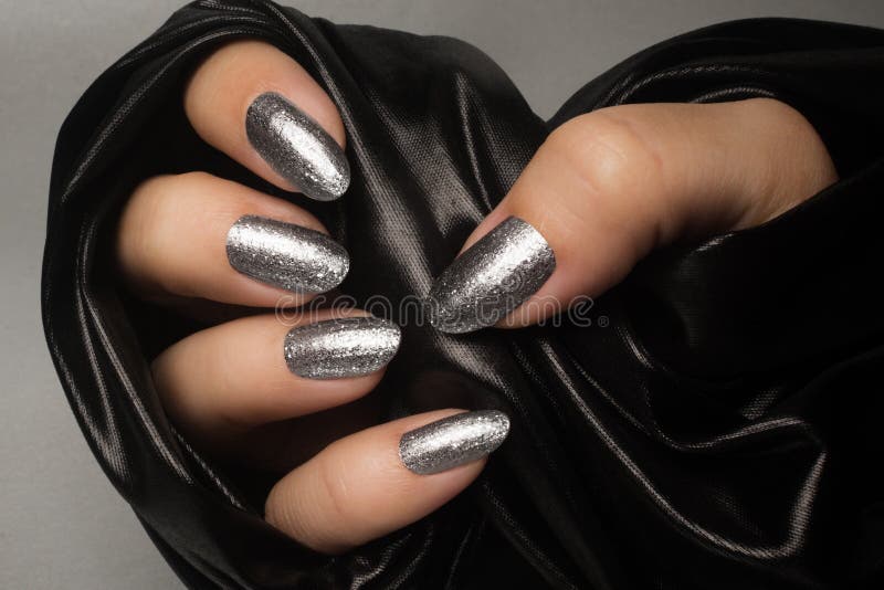 Silver glittered nails manicure royalty free stock photos