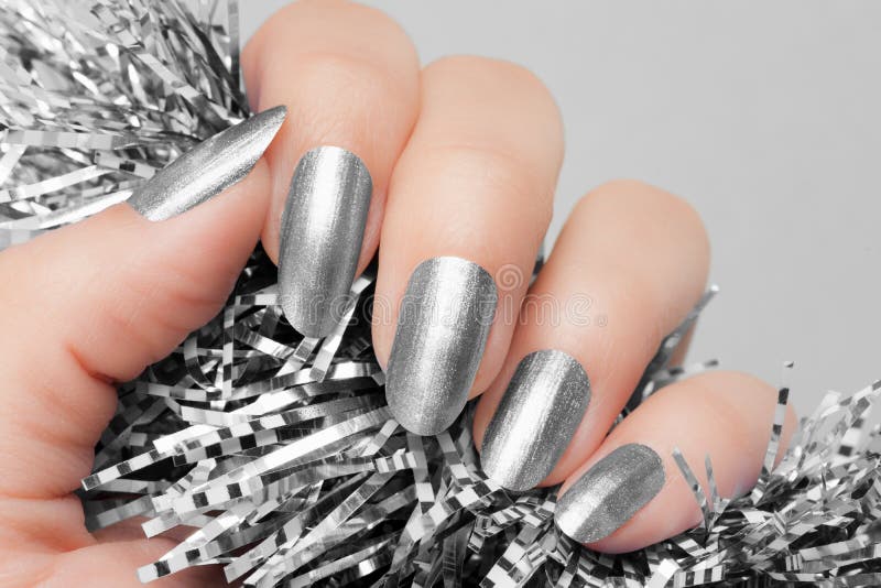 Silver nails manicure stock photography