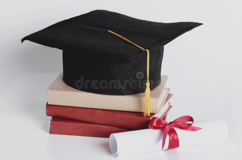 Square academic hat. Graduation. Square academic hat with books royalty free stock image