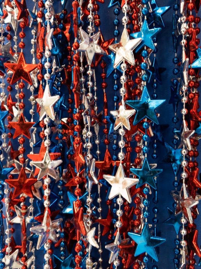 Strands of red,white & blue beads,stars. Great background for July 4th,Memorial Day, Patriots Day,Remembrance Day,patriotic backgrounds royalty free stock photos