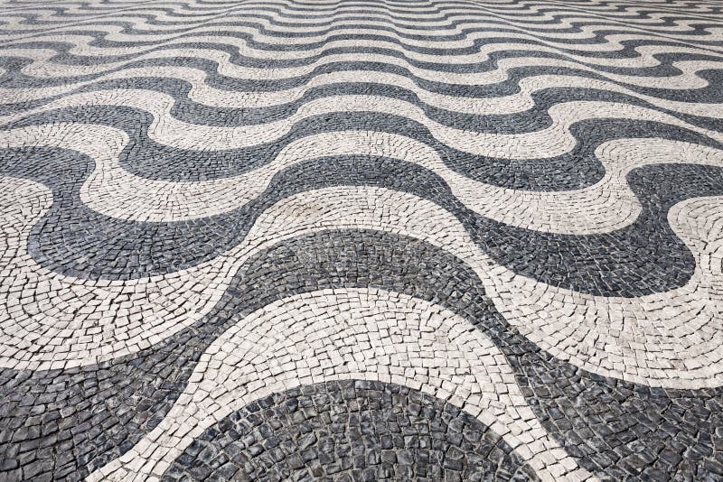 Waves of tiled floor. In portuguese traditional style, Rossio square, Lisbon stock photos