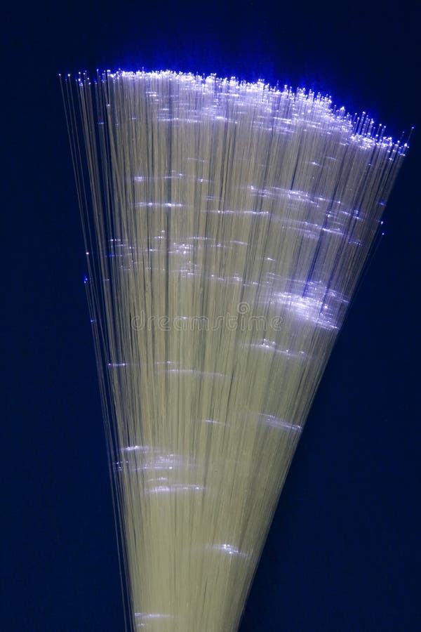 White Light Passing through Fiber Optic Strands. Pure Glass Fibers stock photos