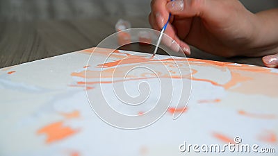 Woman`s hand draws a painting with a brush and paints stock video footage