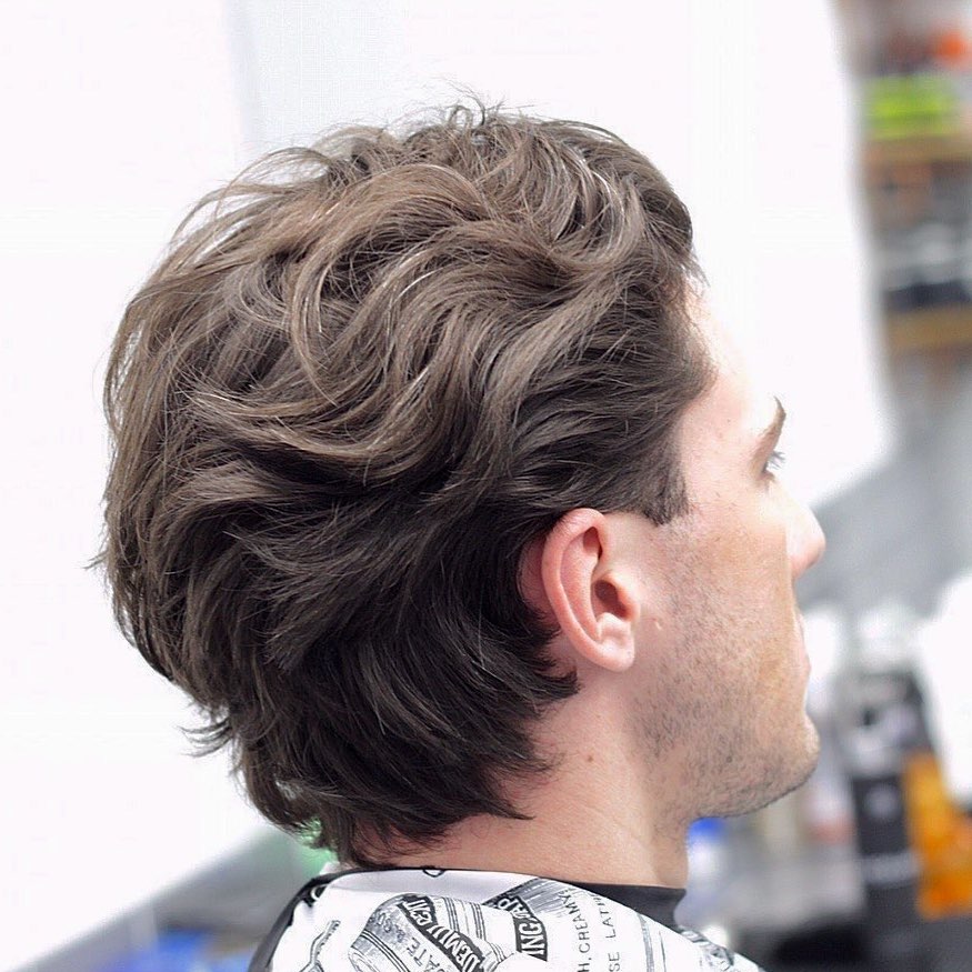 Medium length taper cuts for wavy hair men